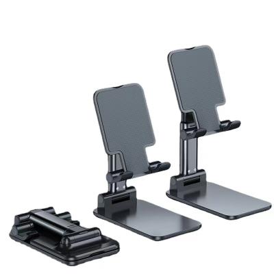 China Dual Adjustable Cheap Foldable Plastic Phone And Tablet Holder Phone Holder for sale