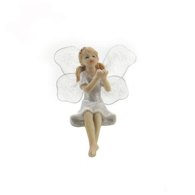 China Art Deco Sweet Spring Little Flower Girl Resin Fairy Sculpture Ornament Home Decorations for sale