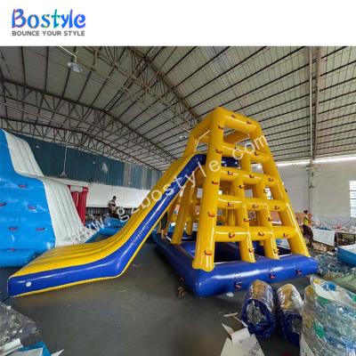 China Classic Popular Plato 0.9mm PVC Tarpaulin Bostyle Design Water Game Slides Stand Inflatable Floating Slide for sale