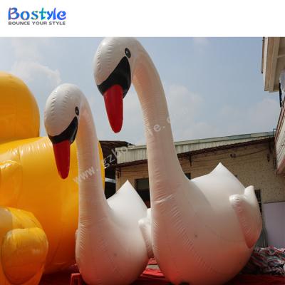 China Commercial giant Plato 0.9mm PVC tarpaulin PVC inflatable toys water cartoon floating swan for sale for sale