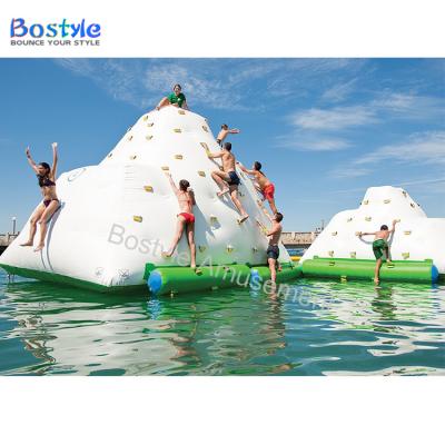 China Funny PVC Inflatable Iceberg Amusement Inflatable Water Mountain Sea Sport Climbing Games for sale