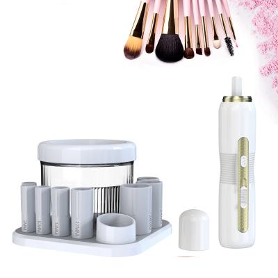 China Automatic Electric Cosmetic Make Up Brush Cleaning Tool With 8 Size Rubber Collars Wash And Dry In Seconds 34*166mm for sale