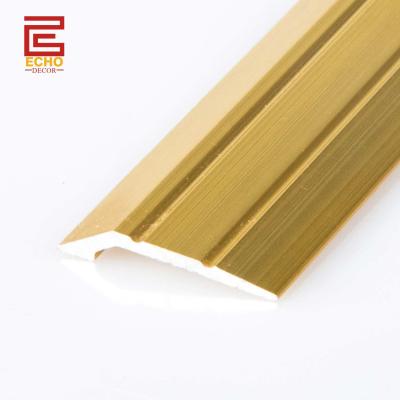 China Aluminum Gold Tile To Concrete Transition Strip Uneven Flooring Reducer Transition Strips for sale