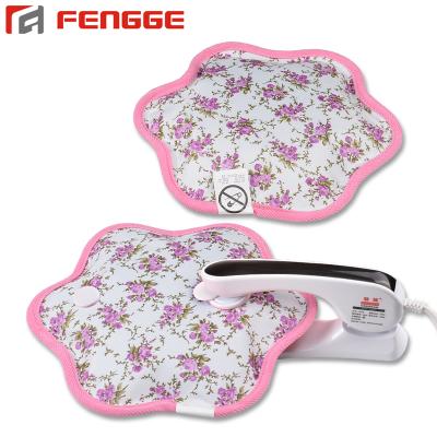 China Printed Fabric Petal Shape Rechargeable Heat Pack Electric Hot Water Bag for sale