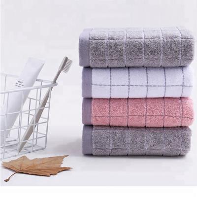 China Custom Luxury Classic QUICK DRY Quality 100% Cotton Face Towel For Gym for sale