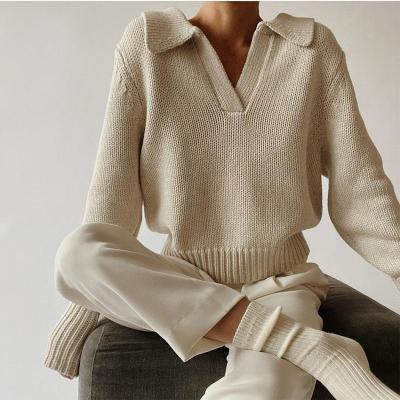 China Loose Women Fashion Ribbed Loose V-Neckline Knit Solid Sweater Tops Casual Long Sleeve Pullover Sweater for sale