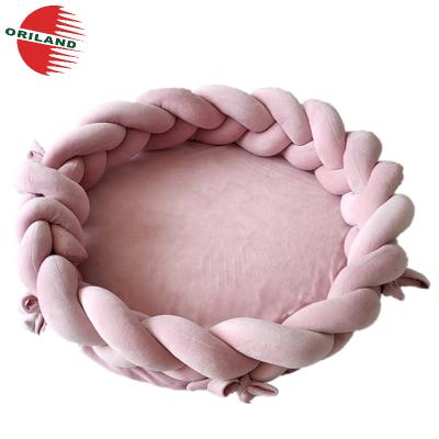 China Soft Cozy Cozy Warm Pink Twist Braid Round Plush Pet Cat Bed Dog Bed Round Pet Nest for sale