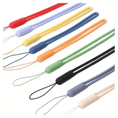 China Unisex Portable Wrist Lanyard Strap Silicone Finger Strap Phone Holder Mobile Phone Hand Strap for sale