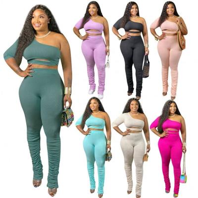 China New Arrival Breathable Pile Sets Hollow Top And Pile Pants Plus Size Fall 2020 Women Two Piece Set Clothes for sale