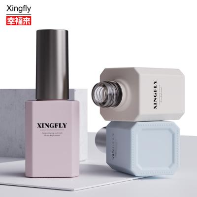 Cina 15 ml Bottiglia di lucido per unghie con confezione cosmetica UV Bottiglie di lucido per unghie vuote con spazzola in vendita