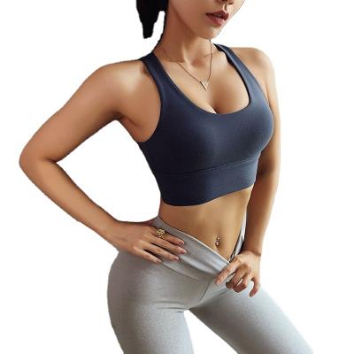 China Beauty back viable cross sports vest sexy fitness yoga women pump bra gym solid color workout crop top for sale