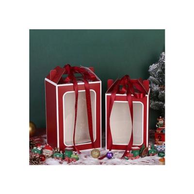 China Gorgeous Recycled Materials Christmas Packaging Box Give Gift Red Cardboard Portable Gift Box With Transparent Window for sale