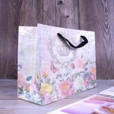 China Recycled Materials Lace With Private Label Logo Gift Shopping Paper Craft Packaging Tote Bag for sale