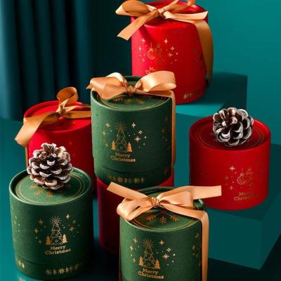 China Recycled Materials Wholesale Red Christmas Eve Gift Giving Candy Xmas Round Packaging Paper Box for sale