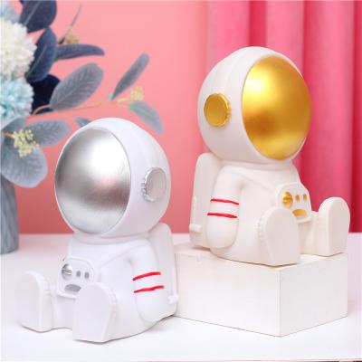 China Cute Astronaut Cartoons Piggy Bank Piggy Bank Coin Bank Ornaments Amazon Time Accessories Kids Slow Home Decor Birthday Decoration Gifts for sale