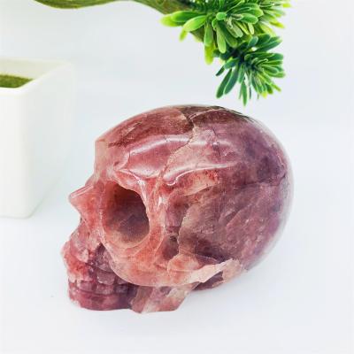 China Europe Wholesale High Quality Hand Carved Natural Red Quartz Crystal Skulls For Strawberry Souvenir for sale