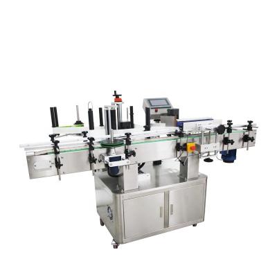 China YTK-220 Automatic Vertical CLOTHING Labeling Machine Rotary Labeler For Round Bottle for sale