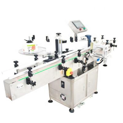 China YTK-260 Automatic Vertical CLOTHING Labeling Machine With Fixed Position Function , Rotary Round Bottle Labeling Machine for sale