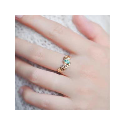 China Cute Collection 18K Gold Vintage Natural Olive Branch Fashion Light Luxury Emerald Diamond Women Ring for sale