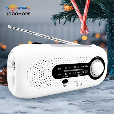 China Headphone jack; solar panel ; Low speaker; power bank; Flashlight ; Dooomore 2022 New Products Solar Powered AM Emergency FM Radios Light Power Bank Operate Rechargeable Portable Mini Hand Crank Radio for sale