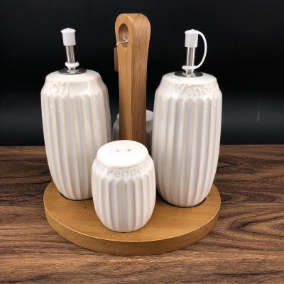 China 2021 Modern Olive Oil Pump Bottle Vinegar Soap Dispenser Oil Water Pump Stored Cosmetic Ceramic Oil Bottle for sale