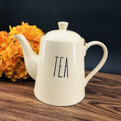 China New Products Modern Design Stocked Tending Teapot With Lid Porcelain Kettle Coffee Ceramic Teapot for sale