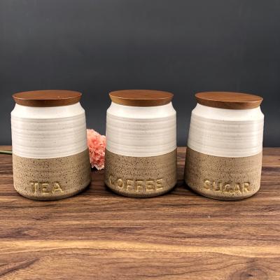 China Stocked 2021 Products Spice Jar Storage Coffee Sugar Tea Storage Ceramic Jar Bamboo Lids for sale