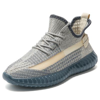 China 2021 Trend Fashion New Casual Breathable Mesh Shoes Flying Pulsating Couples Shoes Shuttle Woven Sports Shoes for sale