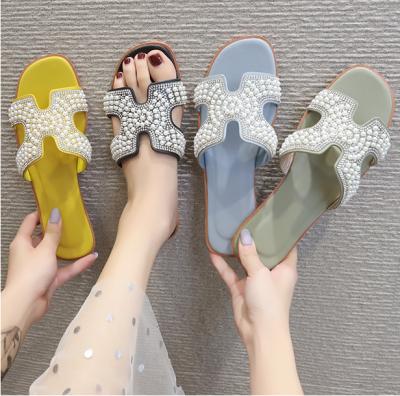 China Fashion Trend Summer Lady Rubber Flat Open Toe Slippers Ideas H Slides Sandals With Beads For Women for sale