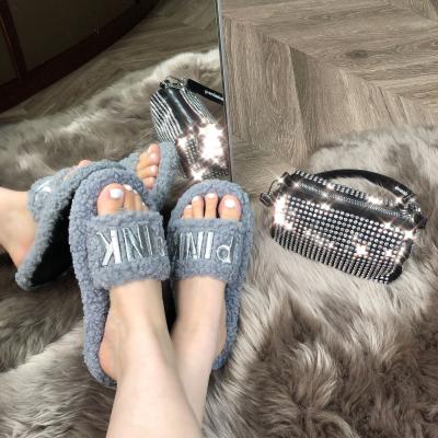 China Fashion Trend Furry Slippers 2021 Winter Autumn Female Flat Word With Fur Slippers Shape Slides Fluffy Slipper for sale