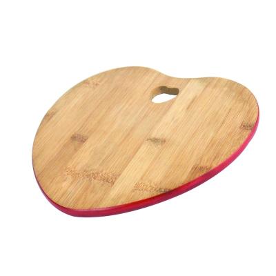 China Wholesale/Custom Heart Shape New Design Disposable Bamboo Cutting Board With Hole Kitchen Chopoing Block Fruit Pizza Cheese Serving Board for sale