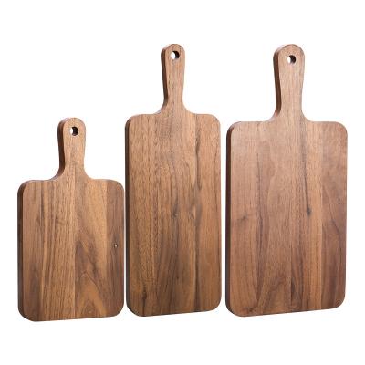 China Disposable Custom Black Walnut Wooden Cutting Board Set With Delicatessen Vegetable Kitchen Fruit Food Cheese Handle Meat Choppers for sale