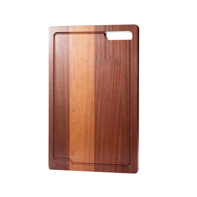 China Disposable Kitchen Edge Grain Chopper Walnut Wood Cutting Board with Juice Groove for sale