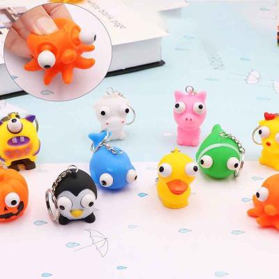 China Cartoon Rubber Animal Squeeze Toy Boom Out Eyes Doll Relaxation Key Antistress Chain Animal Blind Box Toy Figures for sale