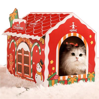 China New Viable Christmas Santa Cat House Corrugated Paper Cat Scratching Board Scratch-Resistant Wear-Resistant for sale