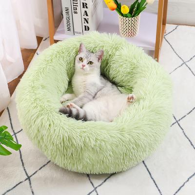 China Hot Sale Heating Popular Goods Custom Made Many Colors Autumn Winter Thickened Plush Donut Pet Bed Available For Cat Rest for sale