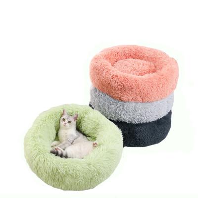 China Long Plush Pet Heating Fluffy Bed For Cat Puppy Donut Soothing Bed Anti Slip Dot Bottom Around Cat Bed for sale