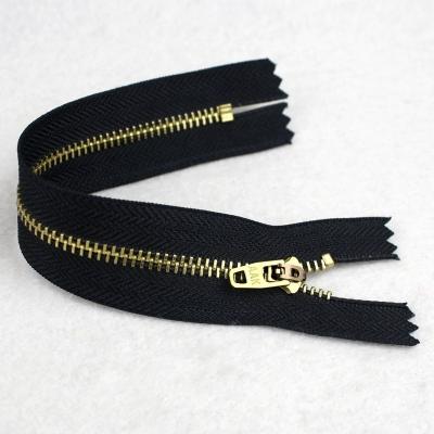 China yg nickel free metal zipper #3 brass jeans zipper metal teeth zipper roll for sale