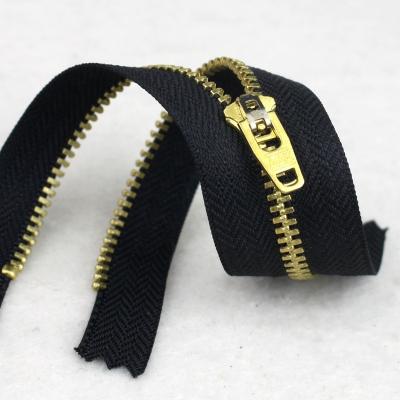 China Durable 3# Jeans Brass Zipper With YG Slider for sale