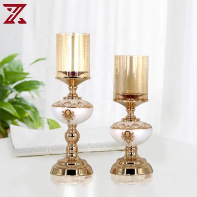 China China factory home decoration candlestick personality metal gold glass candle holder with glass shade for decoration for sale