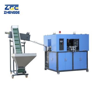 China 200ML 500ML 750ML 1L 2500BPH full automatic 2 cavity PET plastic bottle blow molding machine price for sale