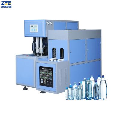 China Bottle 2 Cavity Semi Automatic PET Plastic Mineral Bottled Water Bottle Making Machine Price for sale