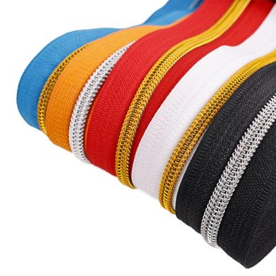 China Durable high quality 5# color nylon zipper in roll customized nylon long chain zipper for shoes boots long chain nylon zipper for sale