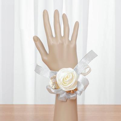 China Wedding Decoration Pafu Amazone 7 Color Bracelet Band Bracelet For Prom Wedding White Rose Wrist Women Bride Bridesmaid Corsage for sale