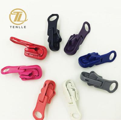 China Cheap Nickel Free Reversible Zinc Alloy Auto Lock Swivel Head Zipper Slider For Jacket Coat for sale