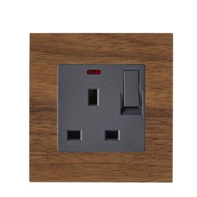 China Standarad Design 250V 13A UK Residential / General Purpose Wooden Wall Switch Electrical Outlet With Light for sale