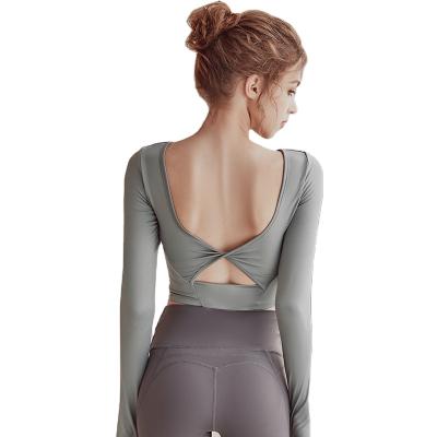 China Spring and summer sports breathable long-sleeved upper suit with chest protection professional training tights fitness clothing women for sale