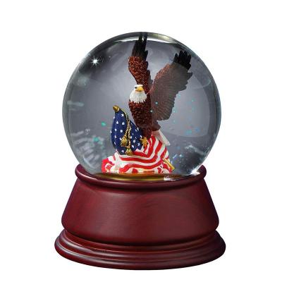 China Custom Europe Christmas Polyresin Water Ball Decor Resin 100mm Snow Globe Souvenir Wholesale Glass Tourist Gifts for sale