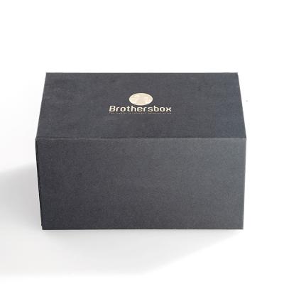 China Recycled Materials Customize Black Foldable Magnetic Closure Gift Cardboard Shipping Luxury Paper Box For Apparel T-shirt Packaging for sale