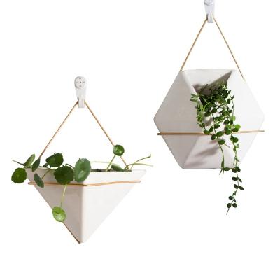 China Nordic modern ceramic flower shelf gold ironwork flower pot wall hanging style home garden pot for sale